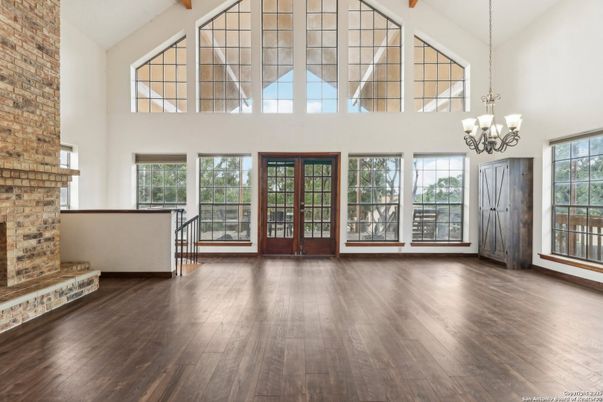 Chandelier, Fireplace, Interior, Stone Walls, Wood Texture Flooring