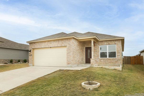 Attached, Backyard, Exterior, Facade, Brick Facade, Mediterranean