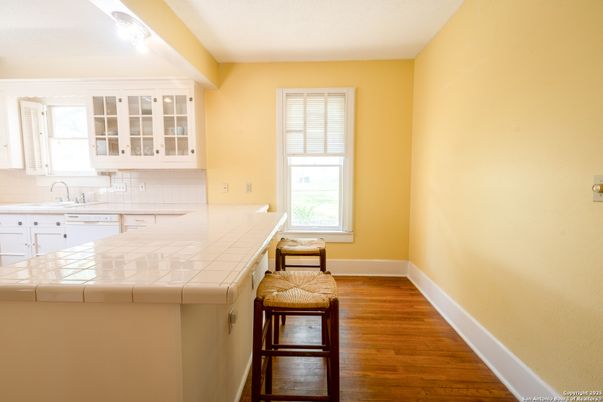 Interior, Kitchen, Tile Countertops, Wood Texture Flooring