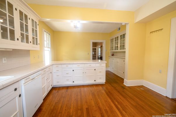 Interior, Kitchen, Tile Countertops, Wood Texture Flooring
