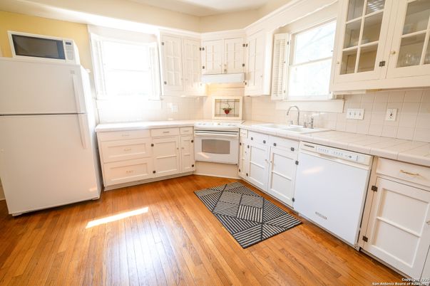 Interior, Kitchen, Tile Countertops, Wood Texture Flooring