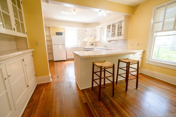 Interior, Kitchen, Tile Countertops, Wood Texture Flooring