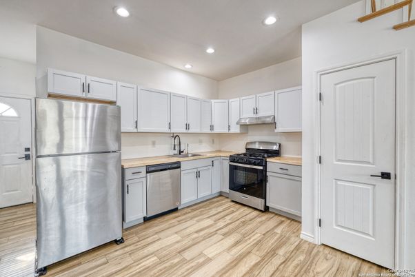 Interior, Kitchen, Recessed Lighting, Stainless Steel Appliances, Wood Texture Flooring