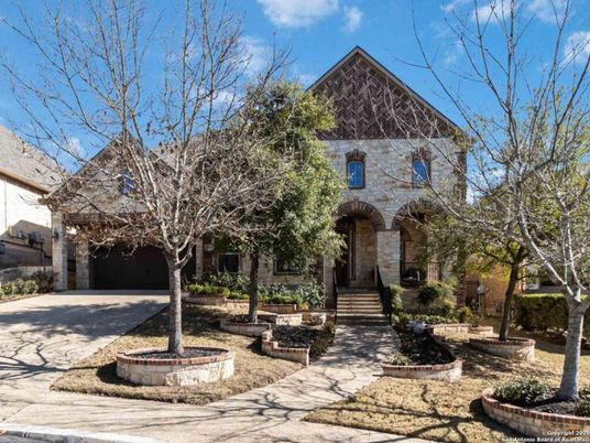Attached, Exterior, Facade, Tudor Revival