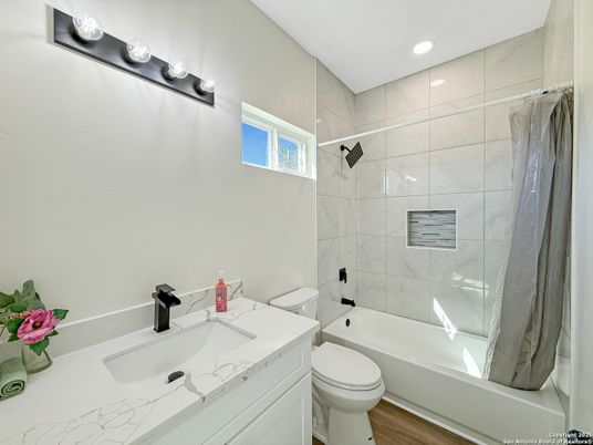 Bathroom, Glass Shower, Interior, Marble Walls, Recessed Lighting, Wood Texture Flooring