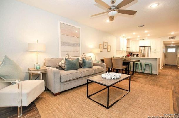Dining room, Interior, Kitchen, Living room, Recessed Lighting, Stainless Steel Appliances, Wood Texture Flooring