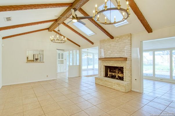 Chandelier, Empty room, Fireplace, Interior, Pendant Lights, Wooden Beams
