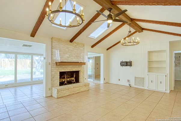 Chandelier, Empty room, Fireplace, Interior, Pendant Lights, Wooden Beams