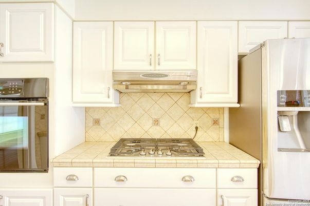 Interior, Kitchen, Stainless Steel Appliances, Tile Countertops