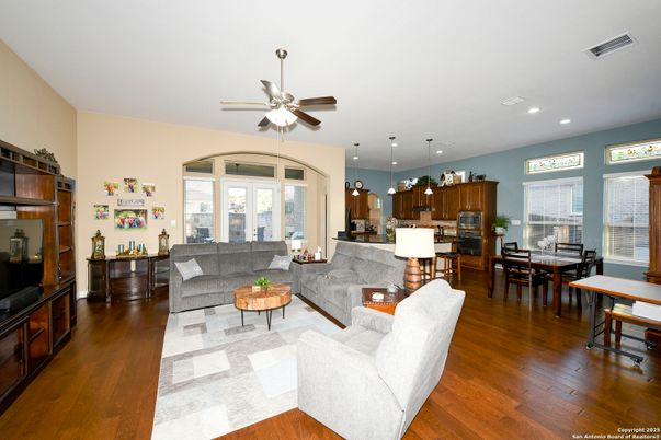 Dining room, Interior, Kitchen, Living room, Pendant Lights, Recessed Lighting, Stainless Steel Appliances, Wood Texture Flooring