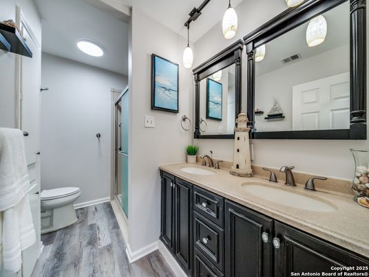 Bathroom, Dual Sink Vanities, Interior, Pendant Lights, Wood Texture Flooring