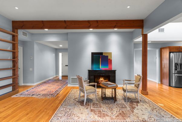 Fireplace, Interior, Living room, Recessed Lighting, Stainless Steel Appliances, Wood Texture Flooring
