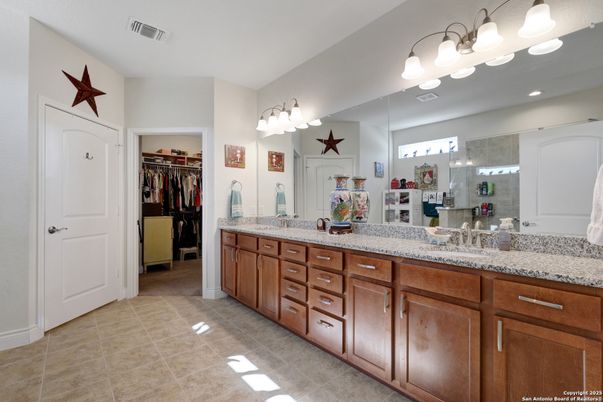 Bathroom, Dual Sink Vanities, Interior, Recessed Lighting, Walk-in Closets