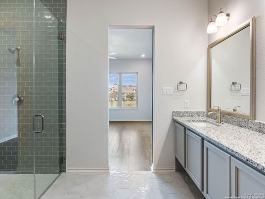Bathroom, Dual Sink Vanities, Glass Shower, Interior, Recessed Lighting, Wood Texture Flooring