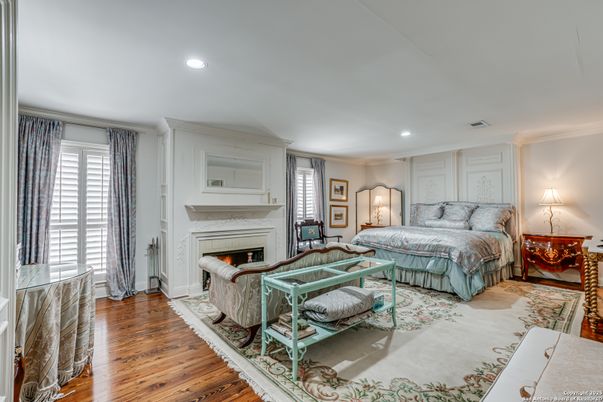 Bedroom, Fireplace, Interior, Recessed Lighting, Wood Texture Flooring