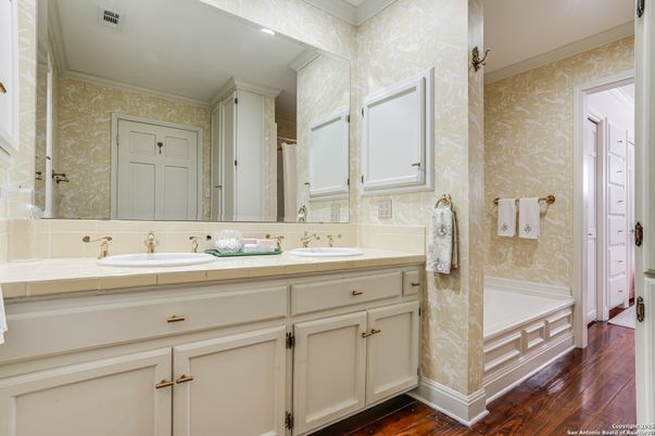 Bathroom, Dual Sink Vanities, Interior, Recessed Lighting, Tile Countertops, Wood Texture Flooring