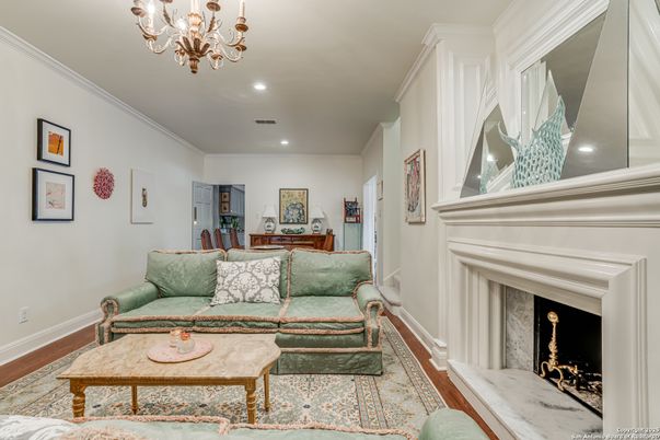 Chandelier, Fireplace, Interior, Living room, Recessed Lighting, Wood Texture Flooring