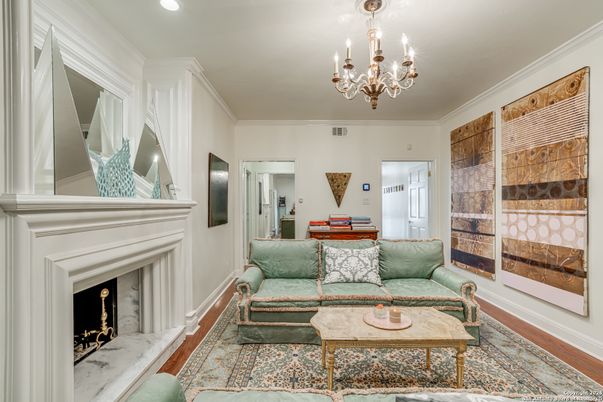 Chandelier, Fireplace, Interior, Living room, Recessed Lighting, Wood Texture Flooring