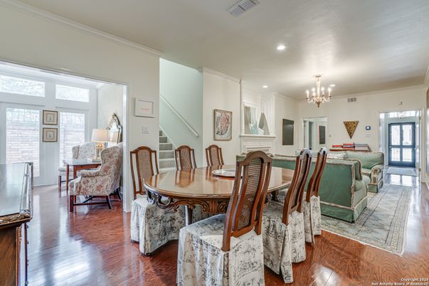 Chandelier, Dining room, Fireplace, Interior, Living room, Recessed Lighting, Wood Texture Flooring