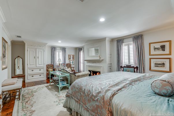 Bedroom, Fireplace, Interior, Recessed Lighting, Wood Texture Flooring