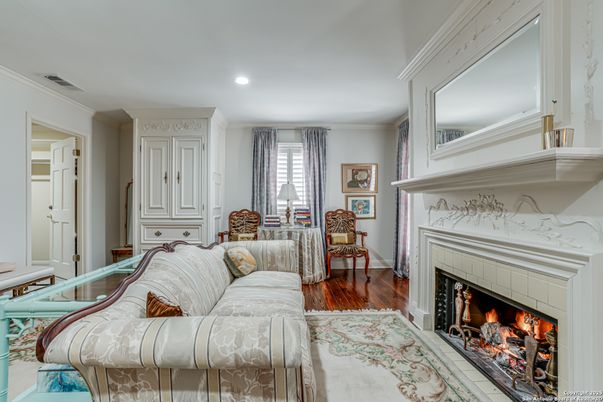 Bedroom, Fireplace, Interior, Recessed Lighting, Wood Texture Flooring