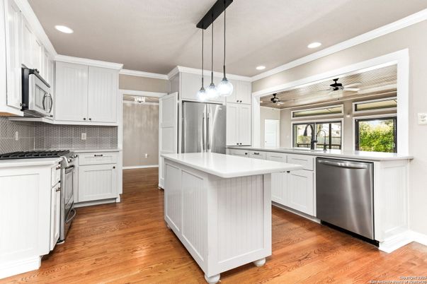 Interior, Kitchen, Pendant Lights, Recessed Lighting, Stainless Steel Appliances, Wood Texture Flooring