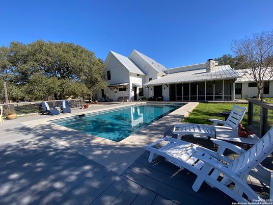 Exterior, Pool, Solar Panels