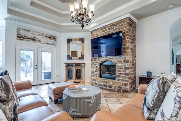 Chandelier, Fireplace, Interior, Living room, Stone Walls