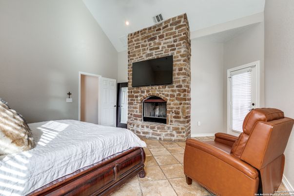 Bedroom, Fireplace, Interior, Recessed Lighting, Stone Walls