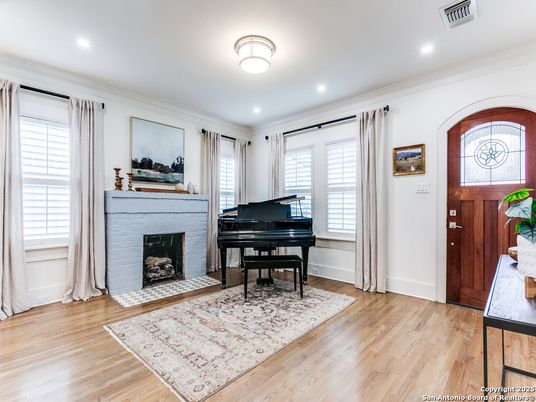 Fireplace, Interior, Piano, Recessed Lighting, Wood Texture Flooring