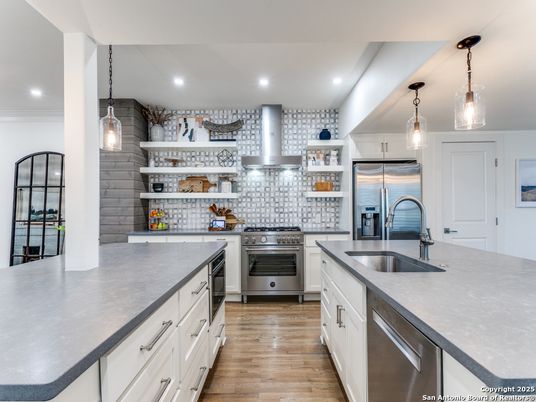 Interior, Kitchen, Pendant Lights, Recessed Lighting, Stainless Steel Appliances, Stone Walls, Wood Texture Flooring
