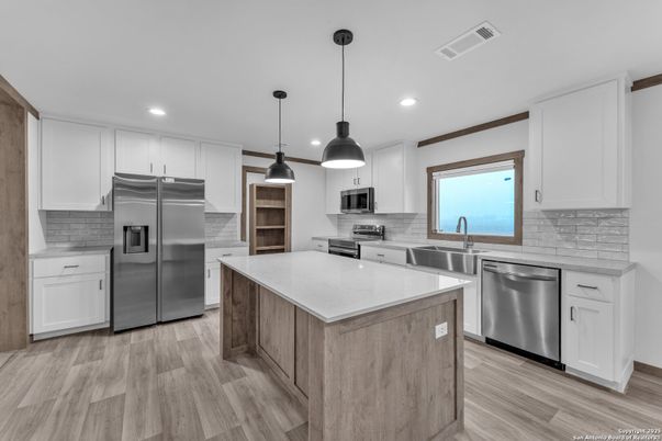 Interior, Kitchen, Pendant Lights, Recessed Lighting, Stainless Steel Appliances, Wood Texture Flooring