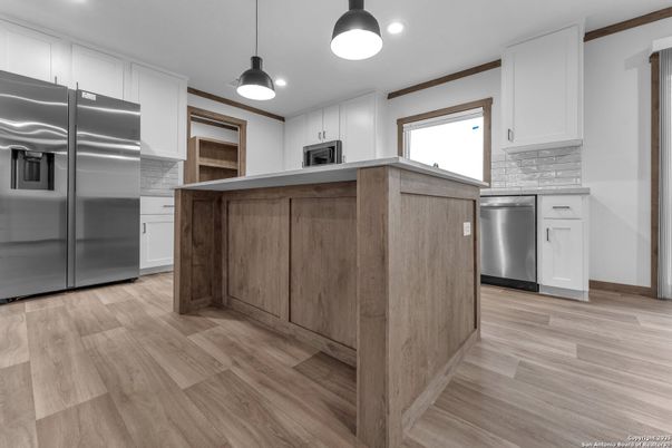 Interior, Kitchen, Pendant Lights, Recessed Lighting, Stainless Steel Appliances, Wood Texture Flooring