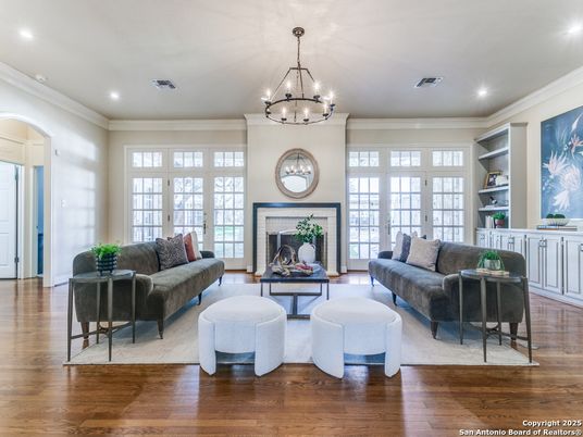 Chandelier, Fireplace, Interior, Living room, Recessed Lighting, Wood Texture Flooring