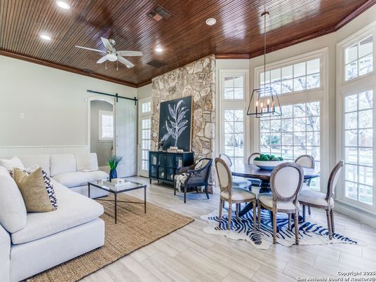 Dining room, Interior, Living room, Pendant Lights, Recessed Lighting, Stone Walls, Wooden Ceilings, Wood Texture Flooring