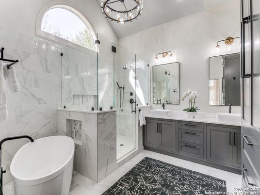 Bathroom, Dual Sink Vanities, Free Standing Baths, Glass Shower, Interior, Marble, Marble Walls, Recessed Lighting