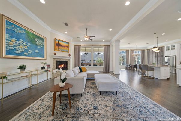 Dining room, Fireplace, Interior, Kitchen, Living room, Pendant Lights, Recessed Lighting, Stainless Steel Appliances, Wood Texture Flooring