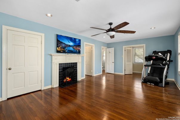 Fireplace, Fitness Equipment, Interior, Recessed Lighting, Wood Texture Flooring