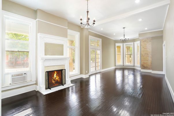 Chandelier, Empty room, Fireplace, Interior, Recessed Lighting, Wood Texture Flooring