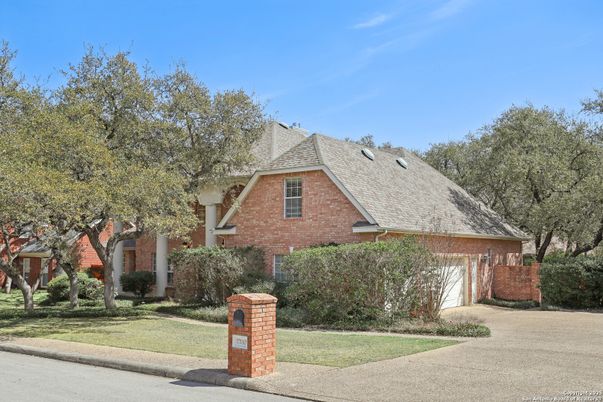 Attached, Exterior, Facade, Brick Facade, Tudor Revival