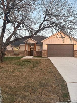 Attached, Backyard, Exterior, Facade, Brick Facade, Ranch