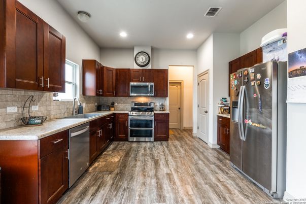Interior, Kitchen, Recessed Lighting, Stainless Steel Appliances, Wood Texture Flooring