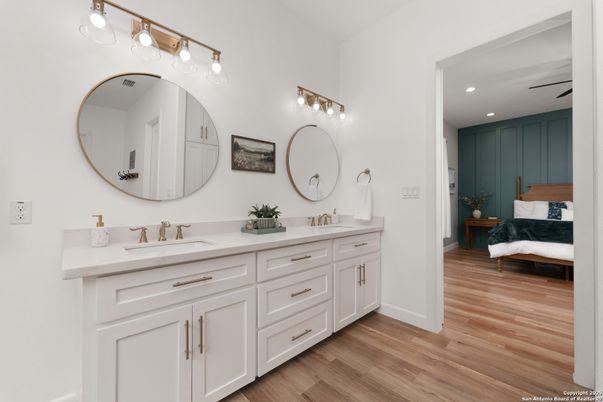 Bathroom, Bedroom, Dual Sink Vanities, Interior, Recessed Lighting, Wood Texture Flooring