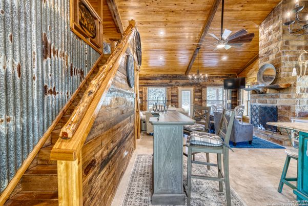 Dining room, Fireplace, Interior, Recessed Lighting, Stone Walls, Wooden Beams, Wooden Ceilings