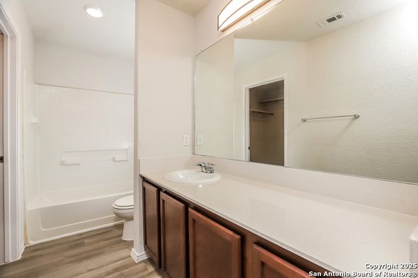 Bathroom, Dual Sink Vanities, Interior, Recessed Lighting, Wood Texture Flooring