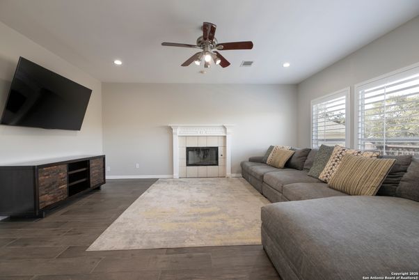 Fireplace, Interior, Living room, Recessed Lighting, Wood Texture Flooring