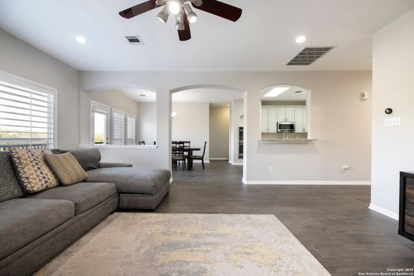 Dining room, Interior, Kitchen, Living room, Recessed Lighting, Stainless Steel Appliances, Wood Texture Flooring