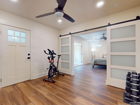 Bedroom, Fitness Equipment, Interior, Recessed Lighting, Wood Texture Flooring