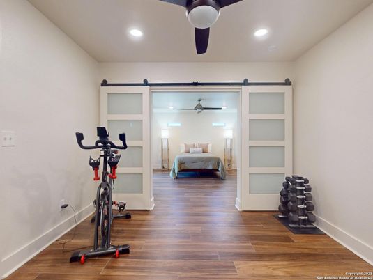 Bedroom, Fitness Equipment, Interior, Recessed Lighting, Wood Texture Flooring