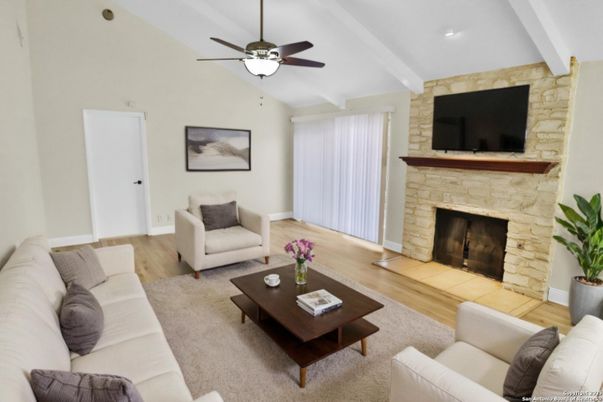 Fireplace, Interior, Living room, Recessed Lighting, Stone Walls, Wood Texture Flooring